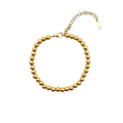 Armband met gouden bolletjes ronde kraaltjes goud Round beats bracelet